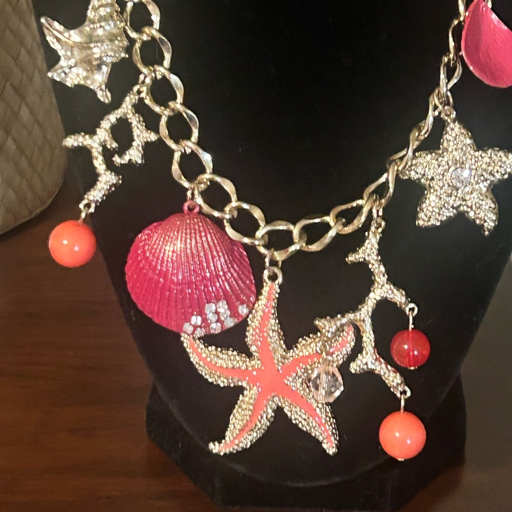 Gorgeous,Gold Necklace with Starfish and Shell Charms.